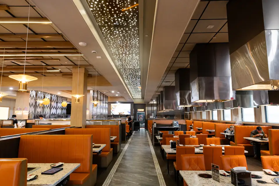 Rows of booths with grill hoods