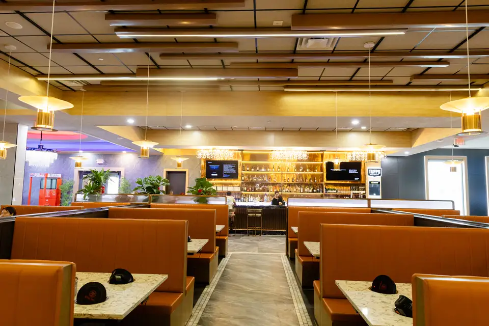 King Pot dining room with orange booths